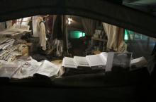  View through the moskito-net into the bedside of the trailer. 