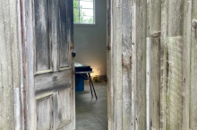 Divided Heavens, entrance to Tom Thomson Shack, McMichael Gallery